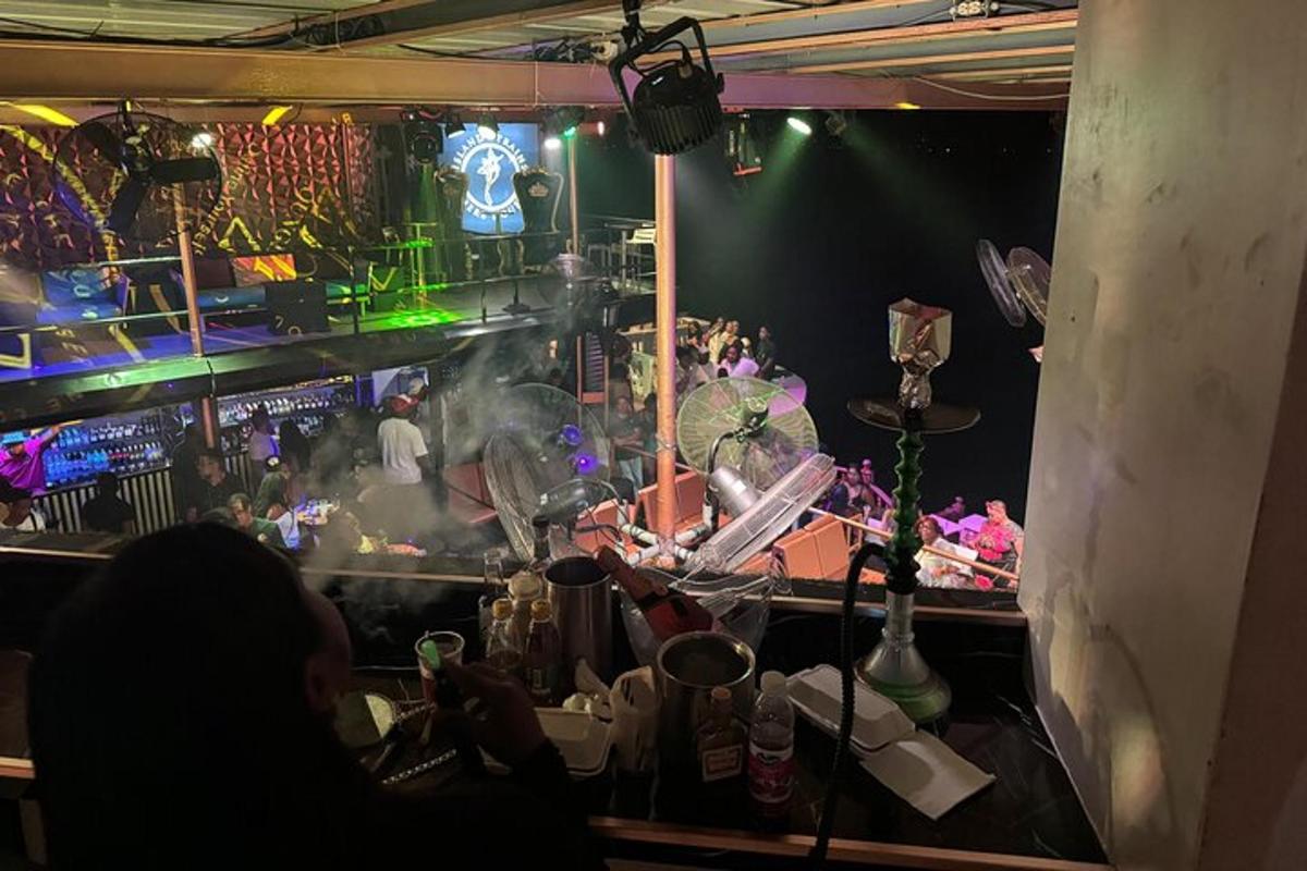 a person sitting in front of a stage
