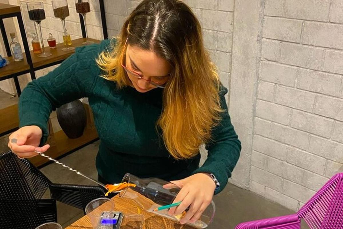 a woman cutting a cake with a pair of scissors
