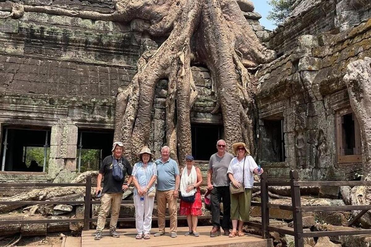 a group of people standing in front of a temple