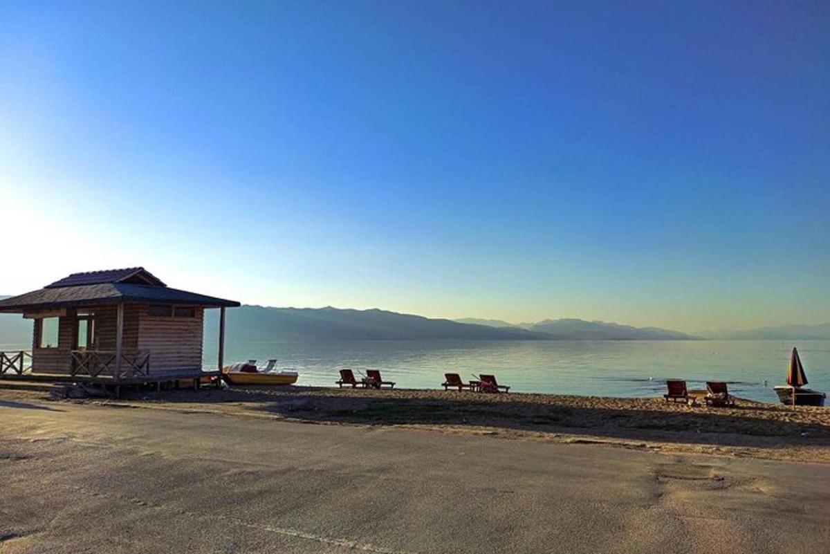 a building on the shore of a body of water