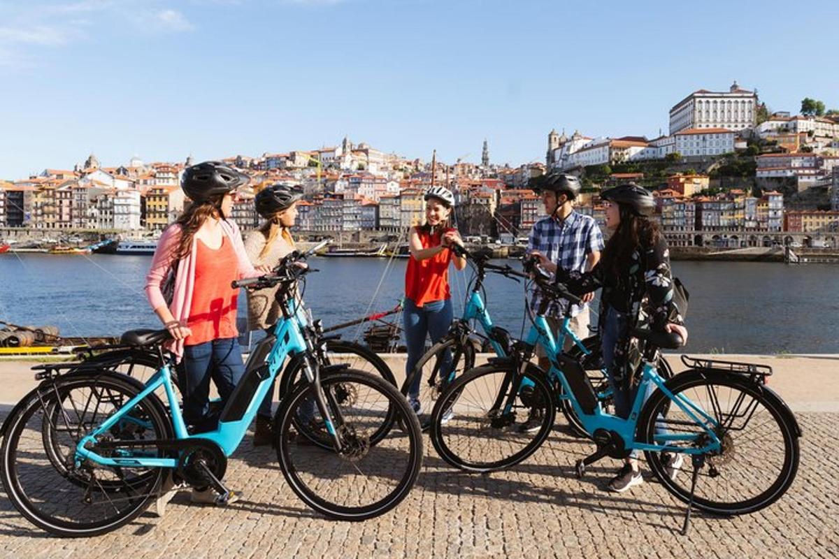 a group of people standing next to their bikes