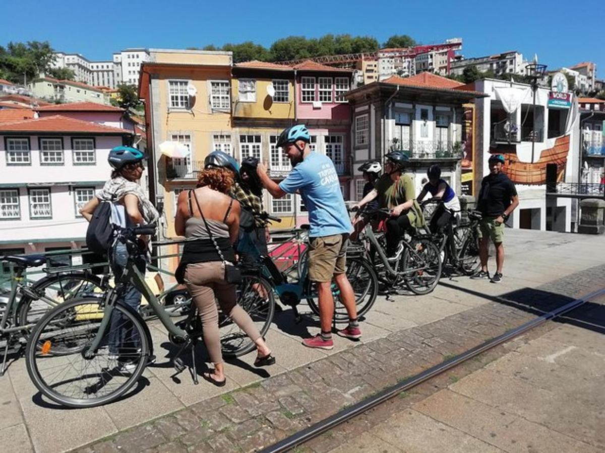 a group of people with helmets on their bikes