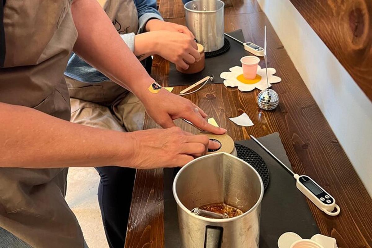 a person preparing food on a wooden table