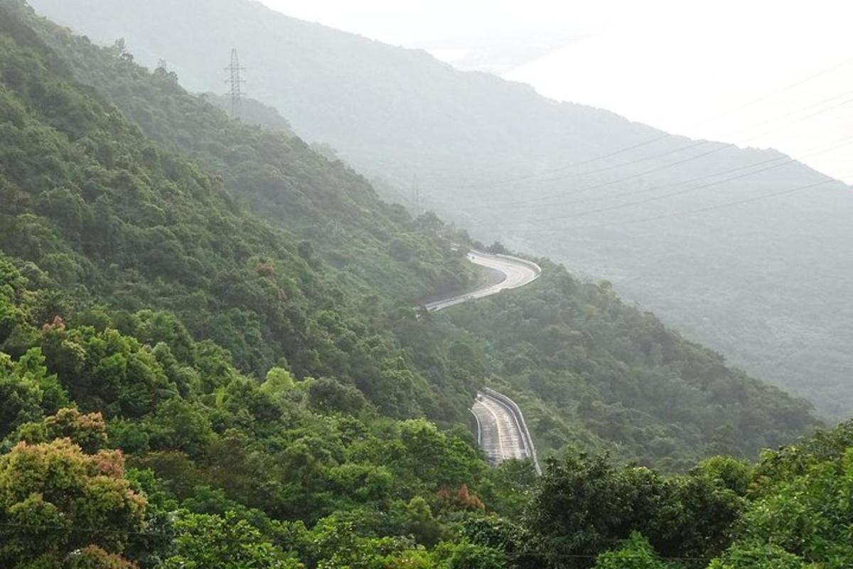 a winding road on the side of a mountain