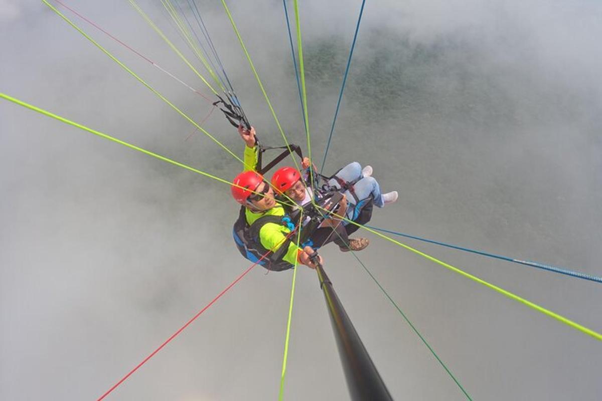 a group of people are in a rope bridge