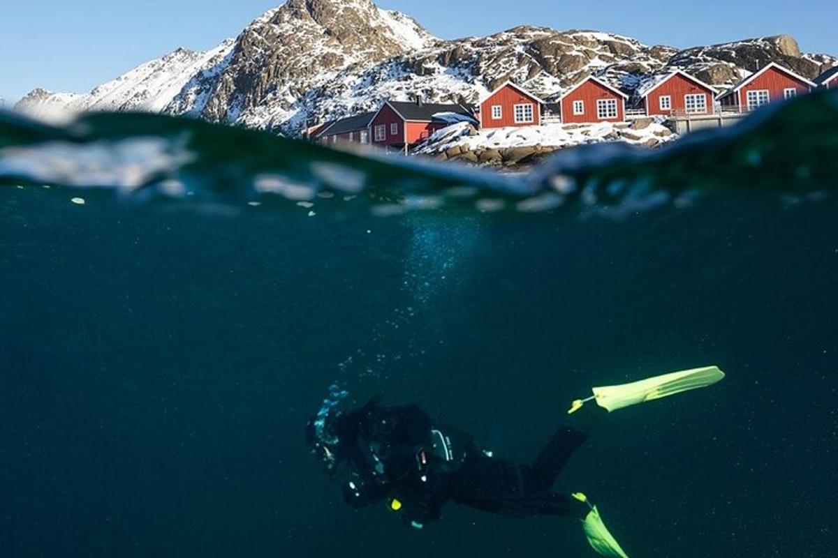 a person in the water with an umbrella