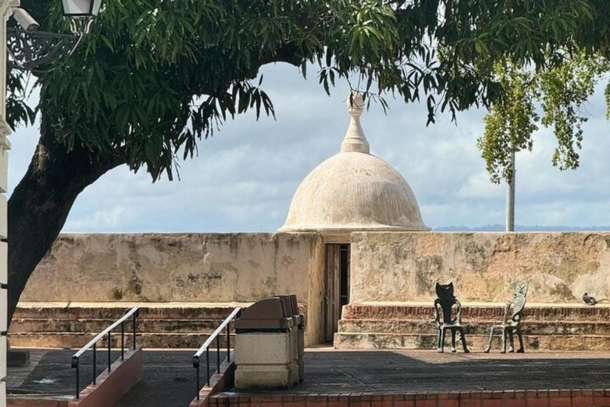 a building with two chairs in front of a building