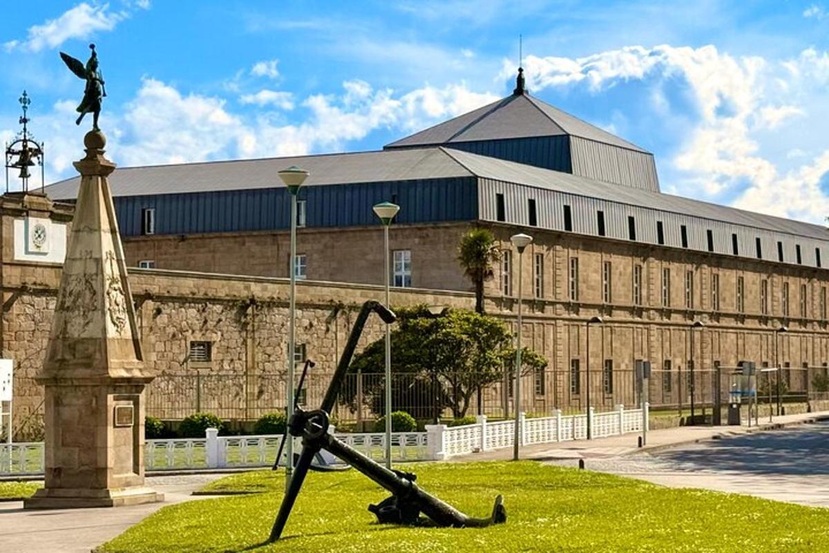 a large building with a statue in front of it