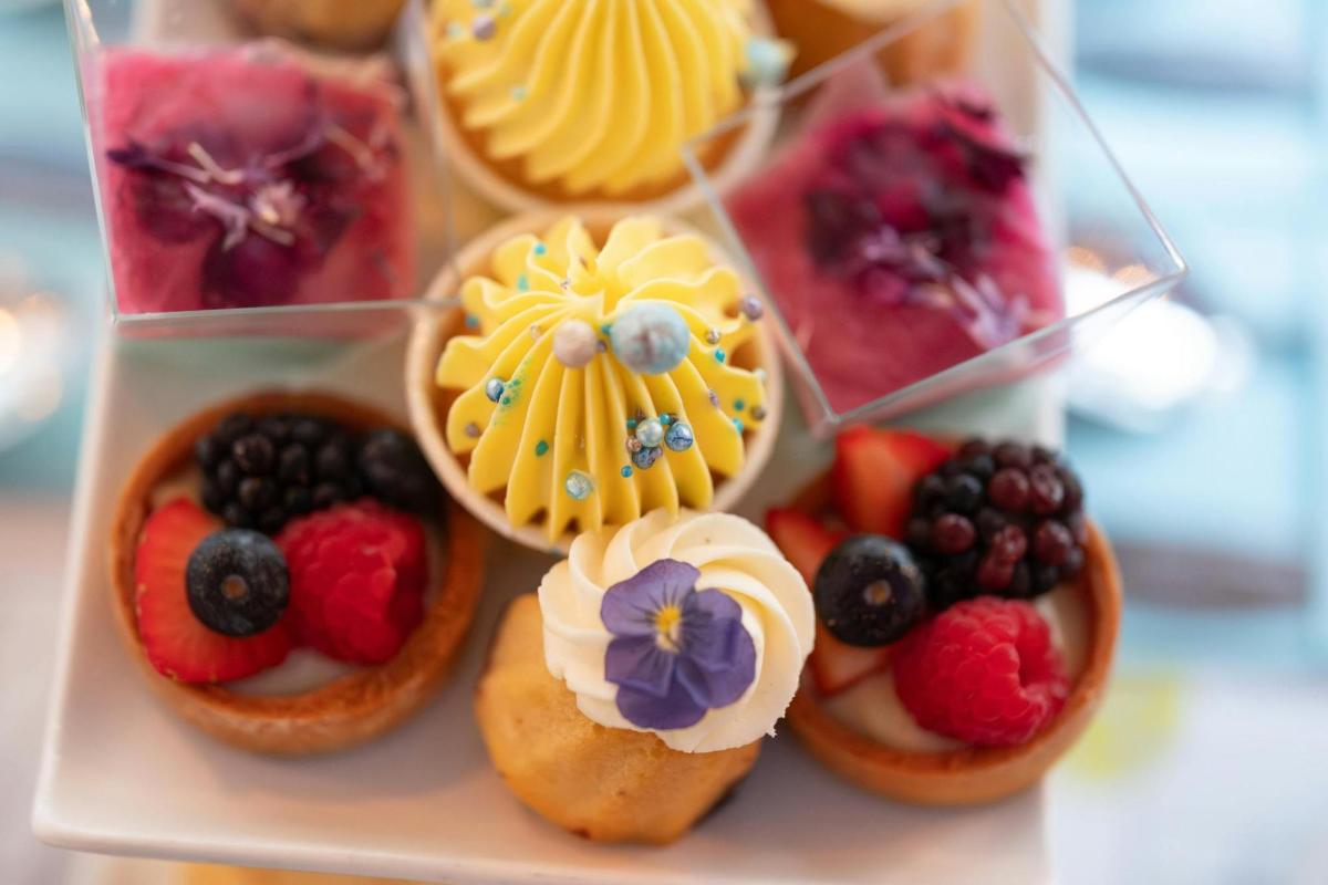 a plate of pastries with fruit on it