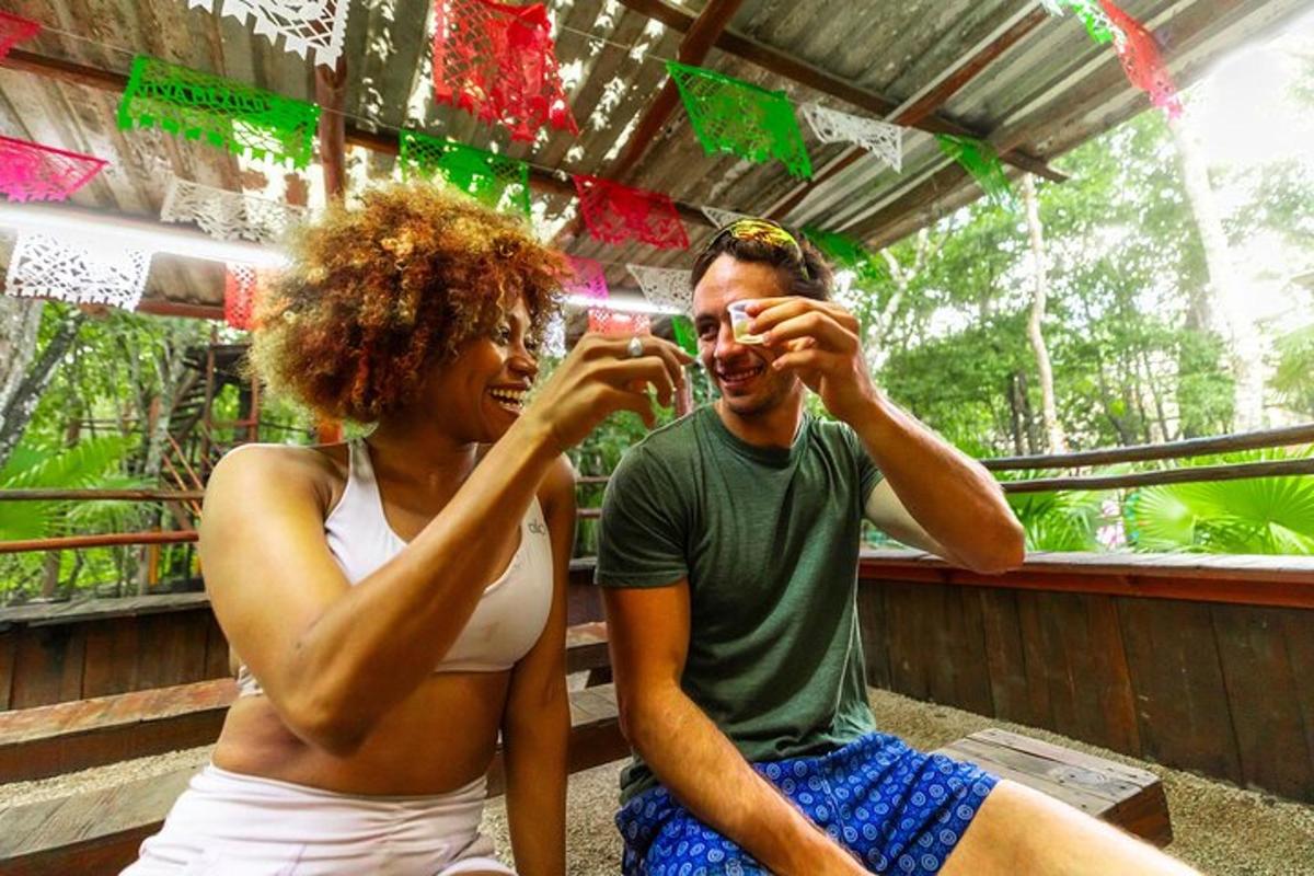 a man and a woman drinking from wine glasses