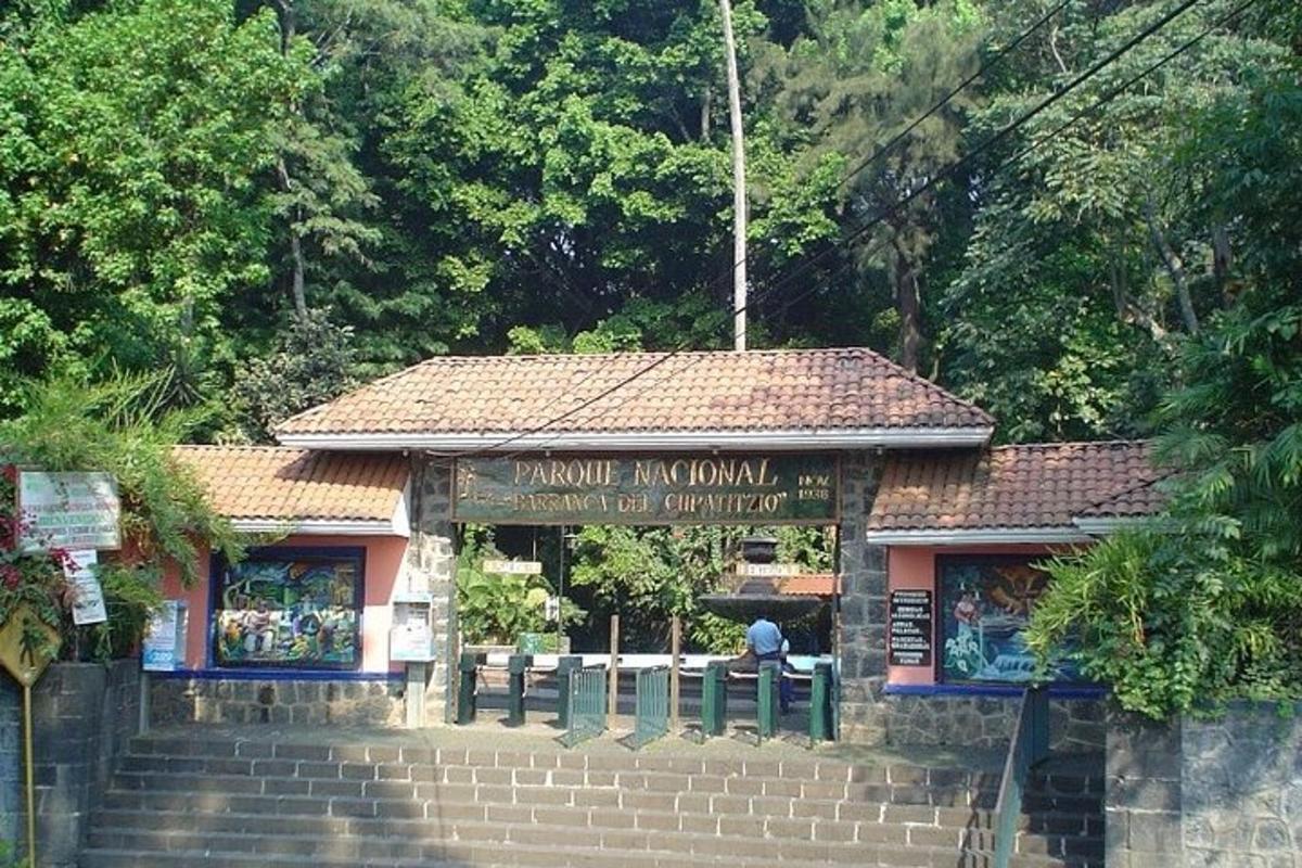 a small building with a sign in front of it