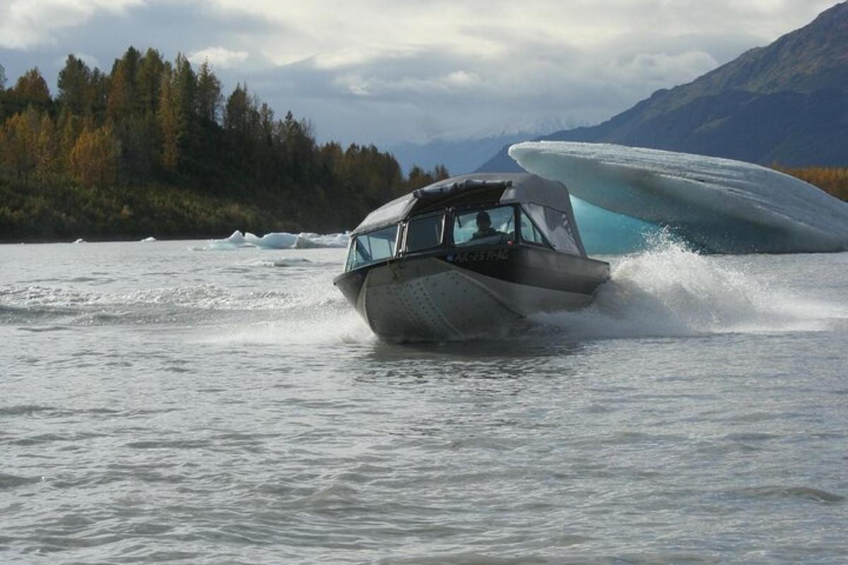 a boat in the water on a lake