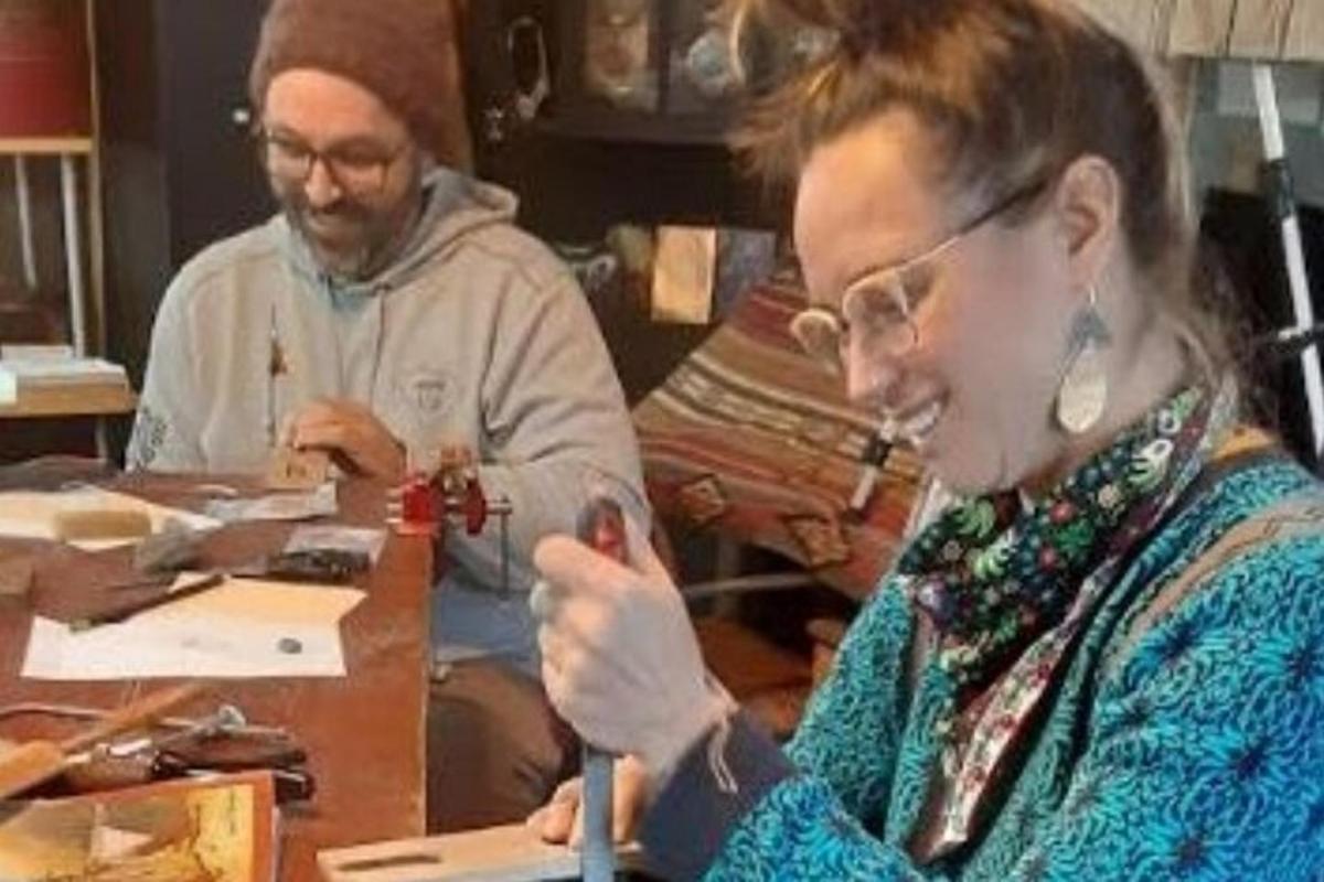 a man and a woman sitting at a table