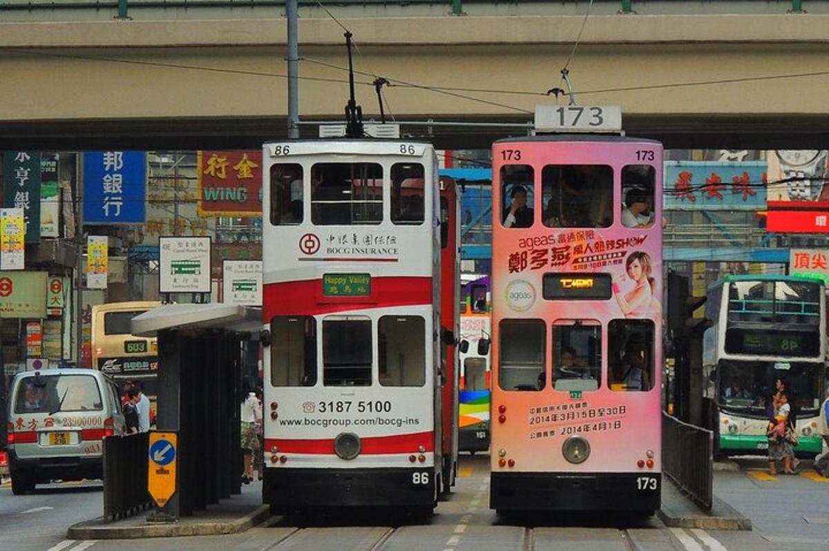 two double decker buses are parked next to each other