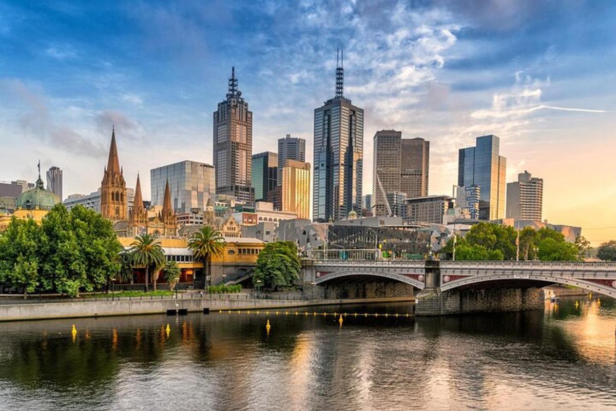 a view of a city with a bridge and a river