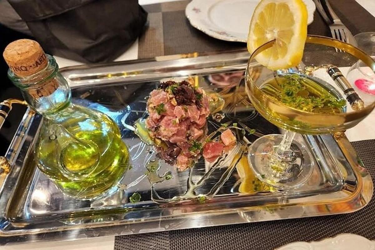 a tray with a bottle of wine and a glass