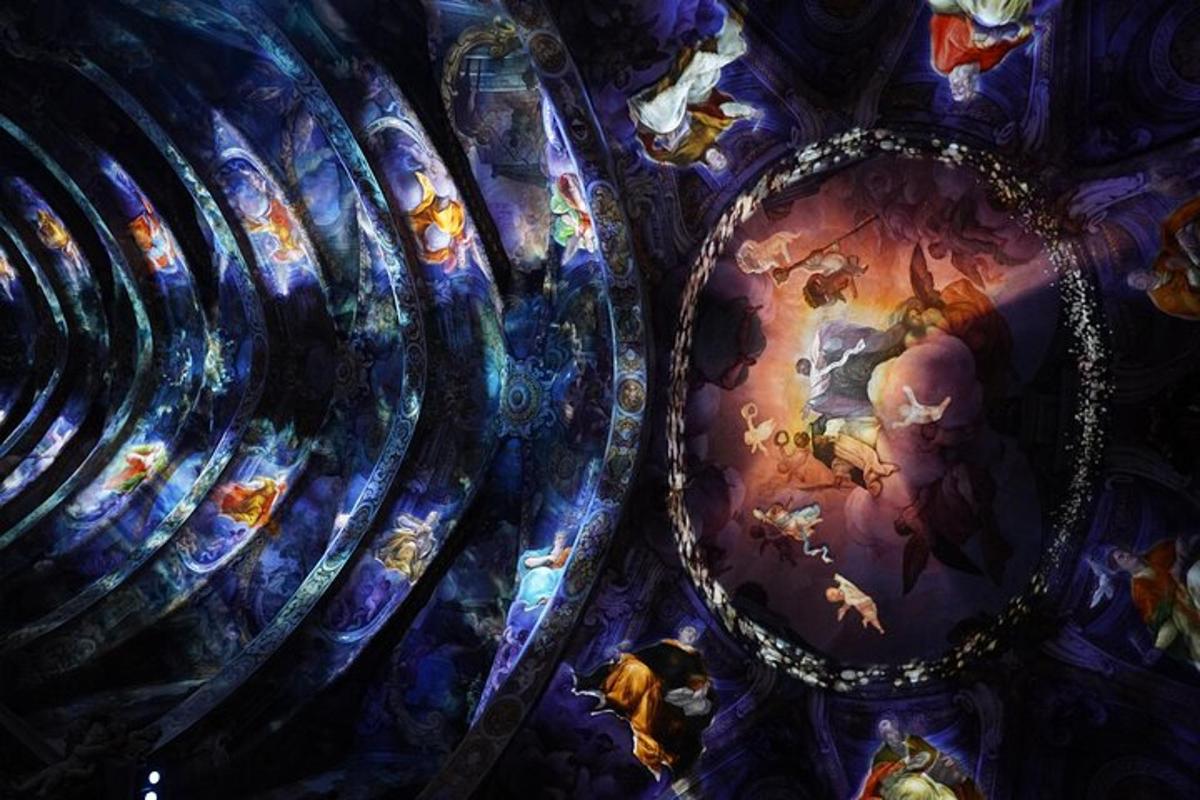a ceiling with a painting of animals on it