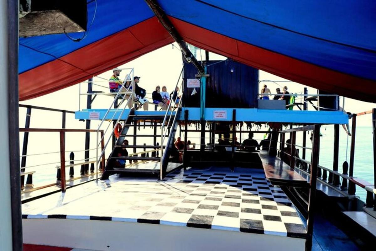 people on a boat with a checkered floor