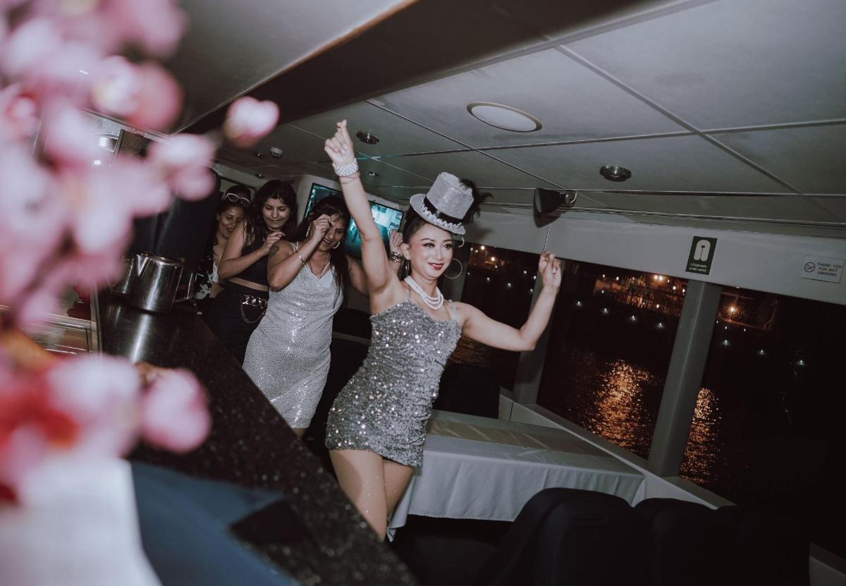 a group of women dancing in a party