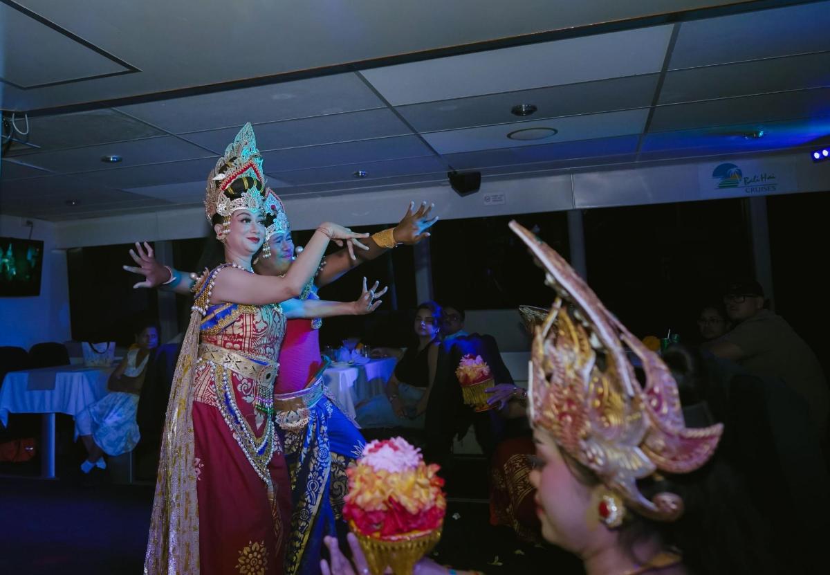 a woman in a costume dancing at a party