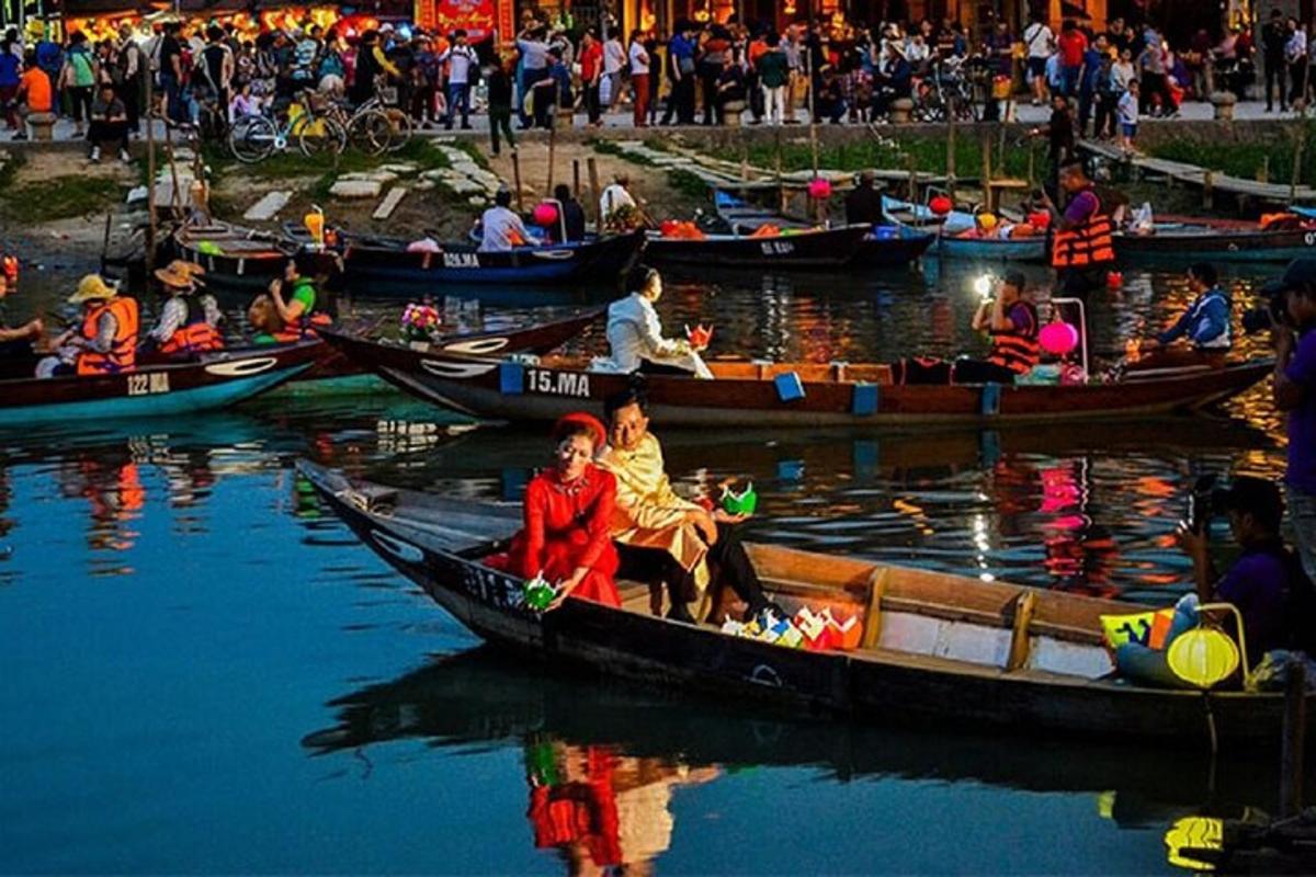 a group of people riding in boats in the water