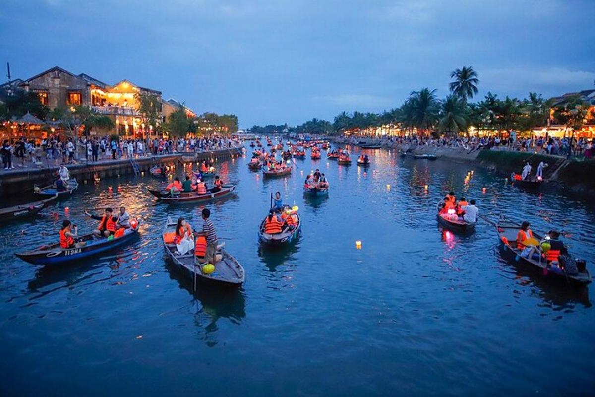 a large group of people in boats in a river