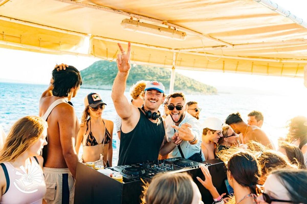 a group of people on a boat on the water