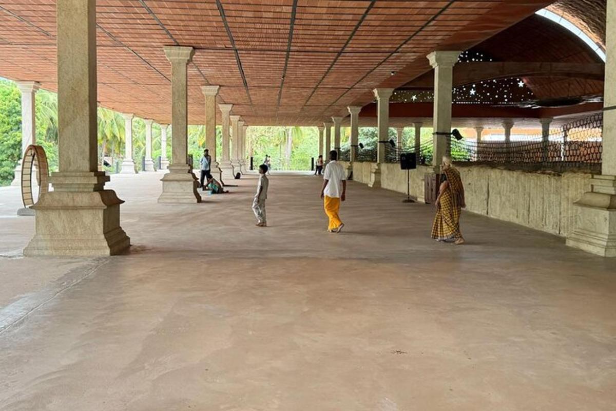 a group of people walking around in a building