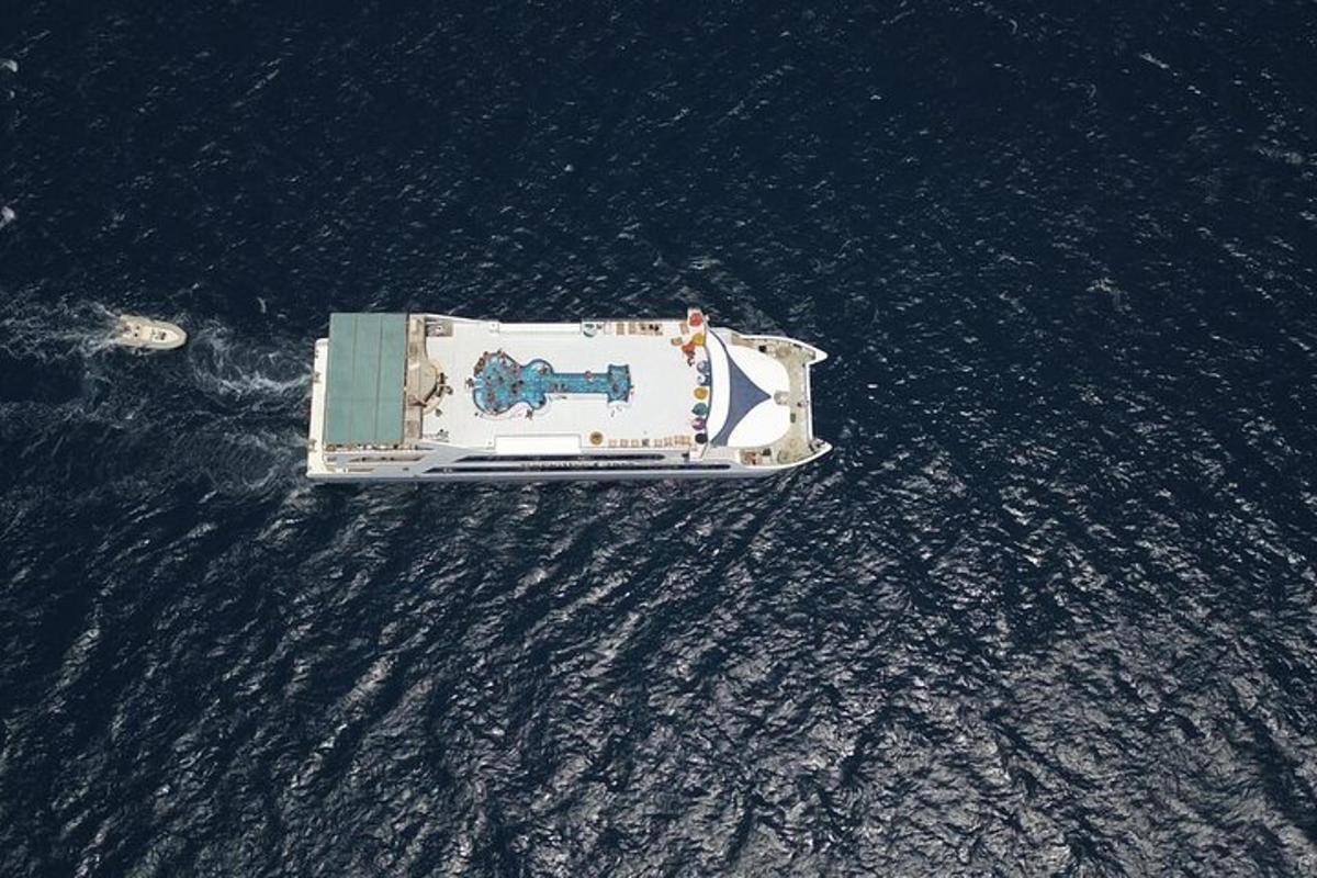 an aerial view of a boat in the water