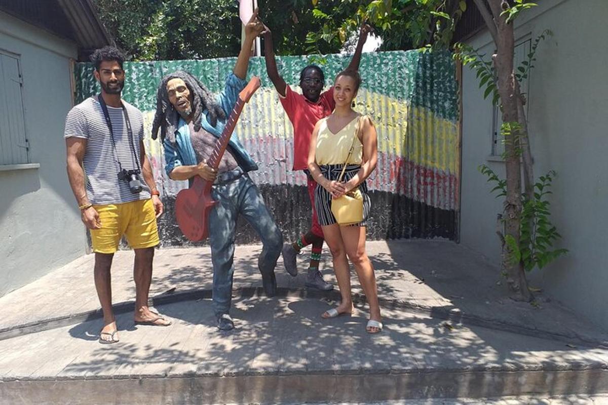 a group of people standing in front of a wall