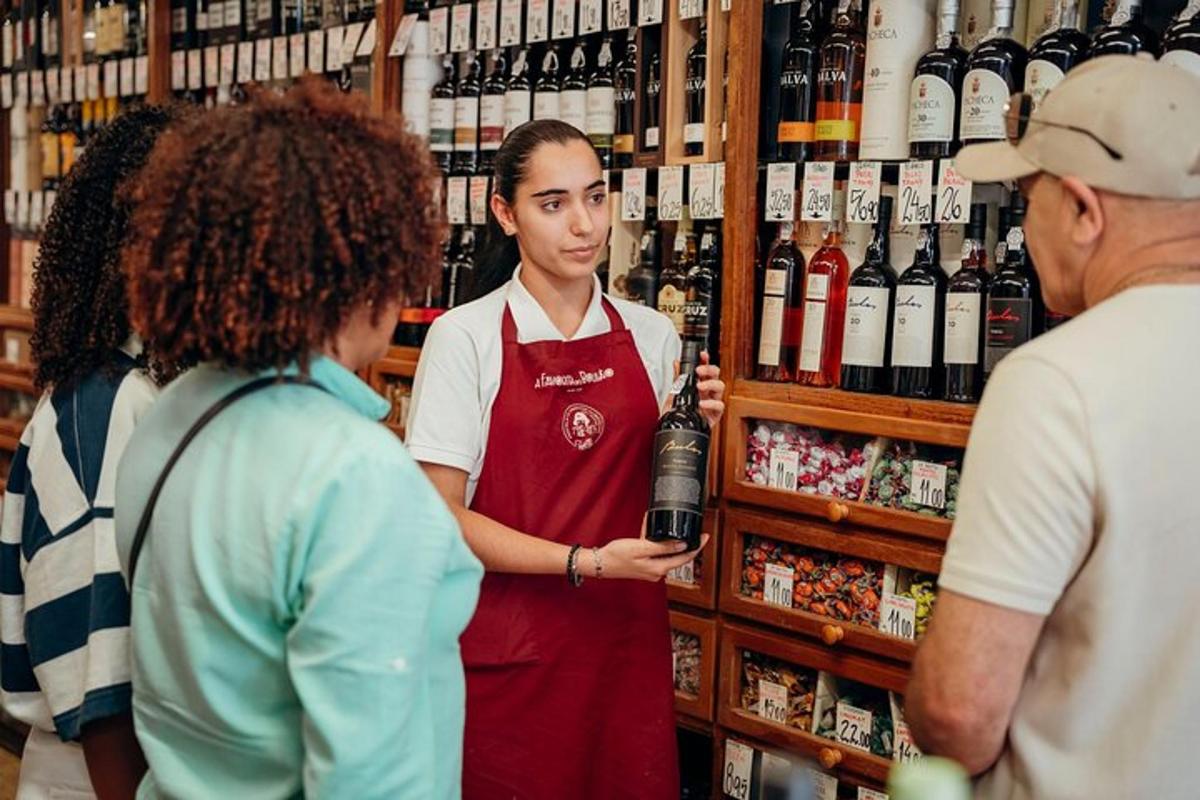 a man holding a microphone in a wine store