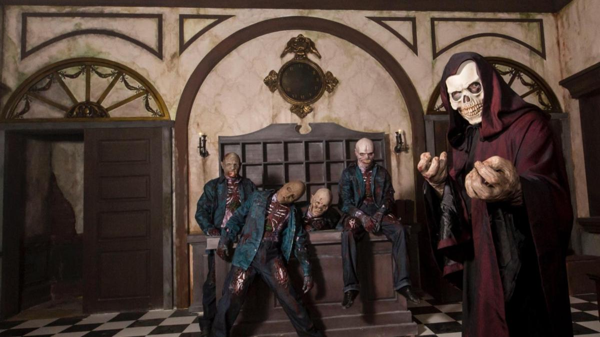a painting of a group of people in a room