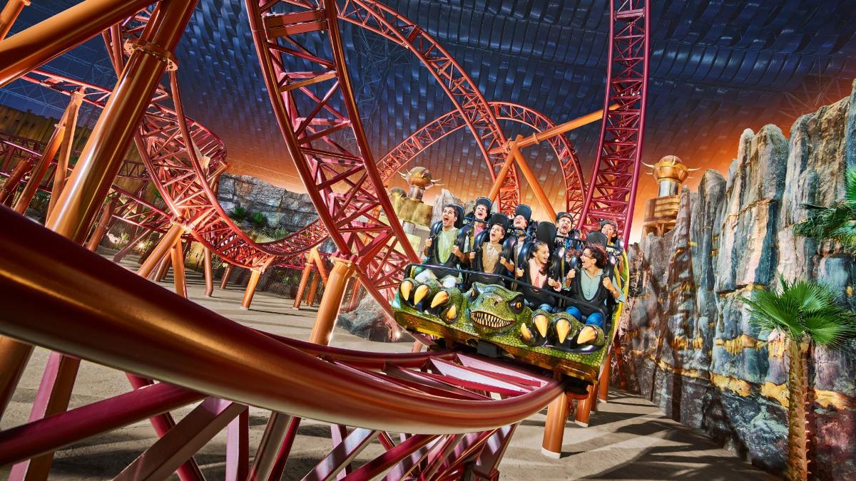a group of people riding on a roller coaster