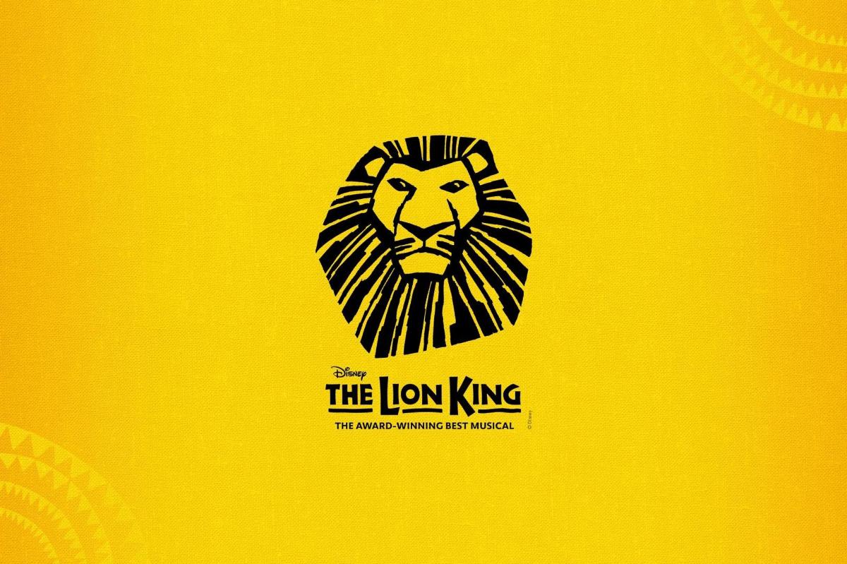 a lion king logo on a yellow background