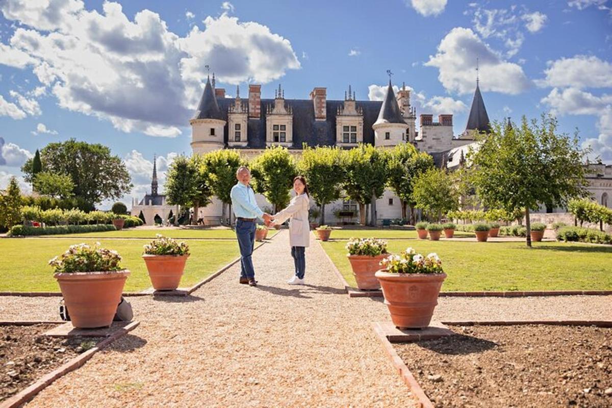 a man and a woman walking in front of a castle