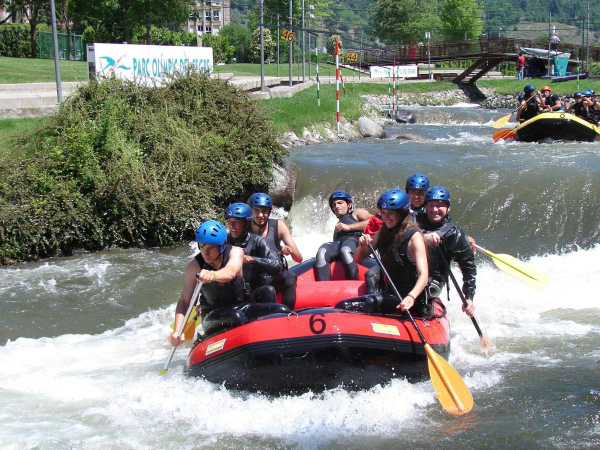 a group of people on a raft in the water