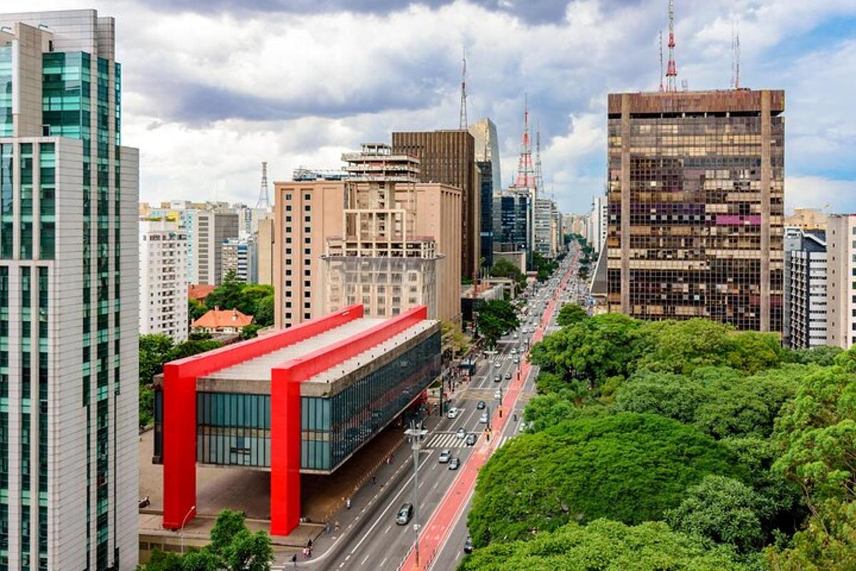 a city with a red building in the middle of a city