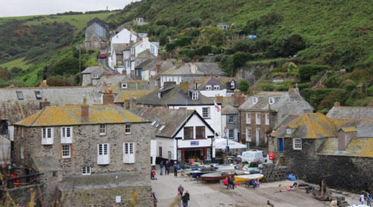 a group of buildings in a small town with people