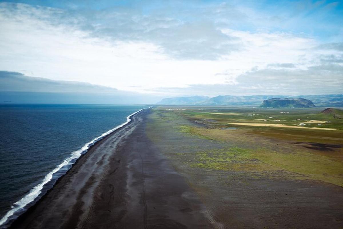 an aerial view of a beach in the ocean