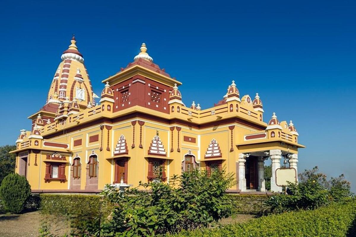 a large yellow building with towers on top of it