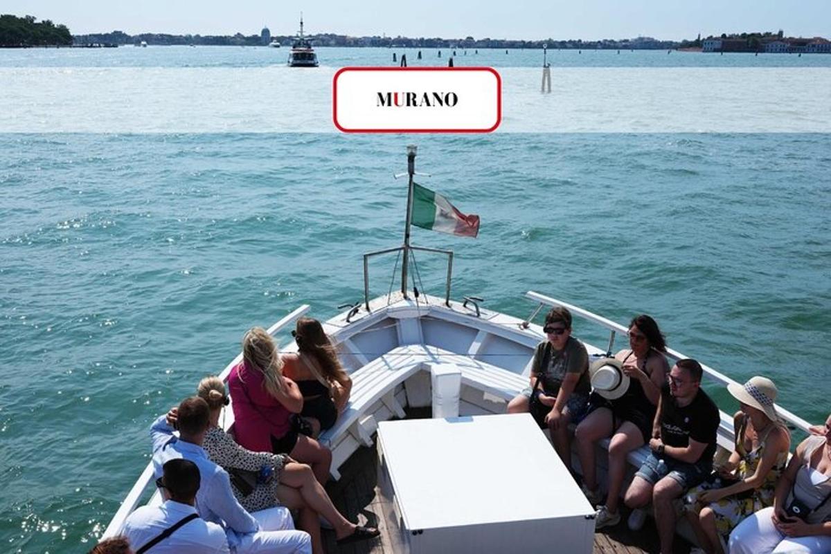 a group of people on a boat in the water