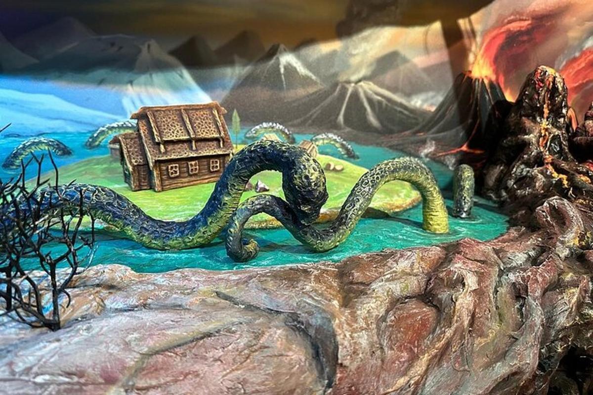 a cake with a snake on top of it