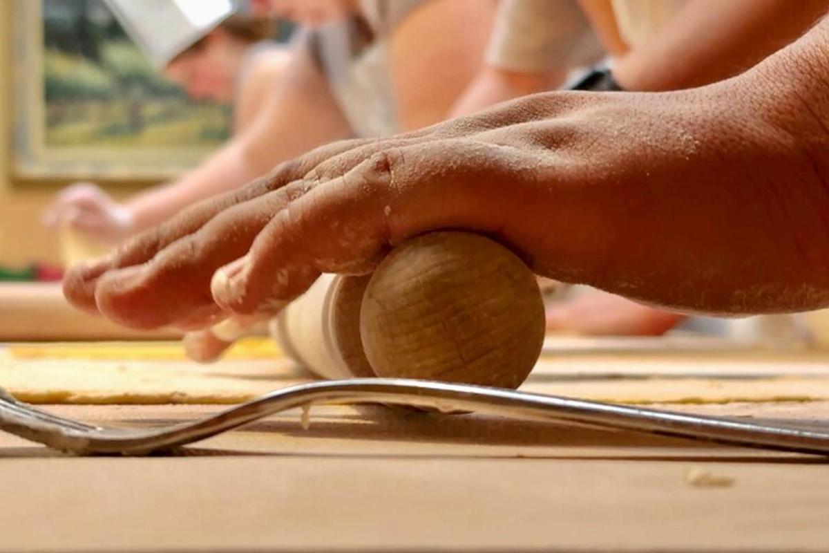 a person is playing with a wooden ball