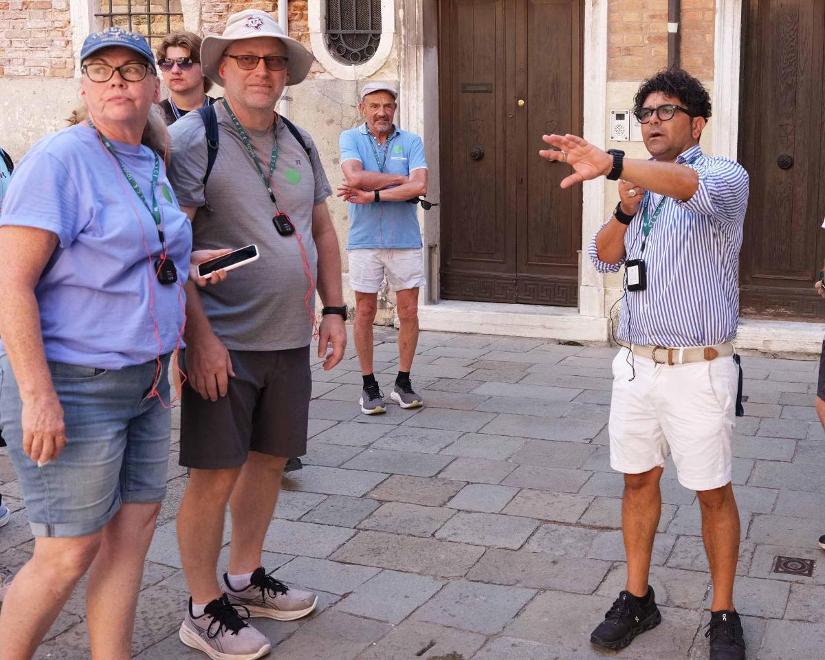 a group of people standing on a street