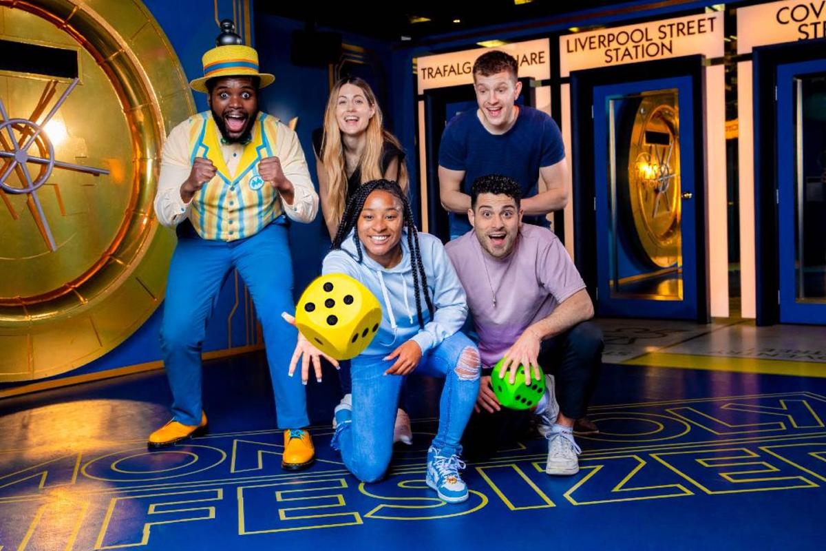 a group of people posing for a picture in a room