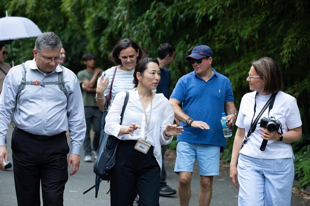 a group of people walking down a street