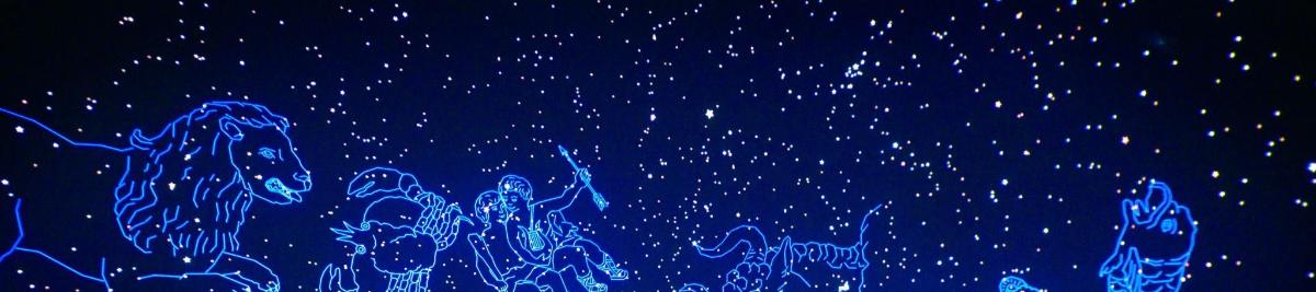 a blue background with stars in the sky