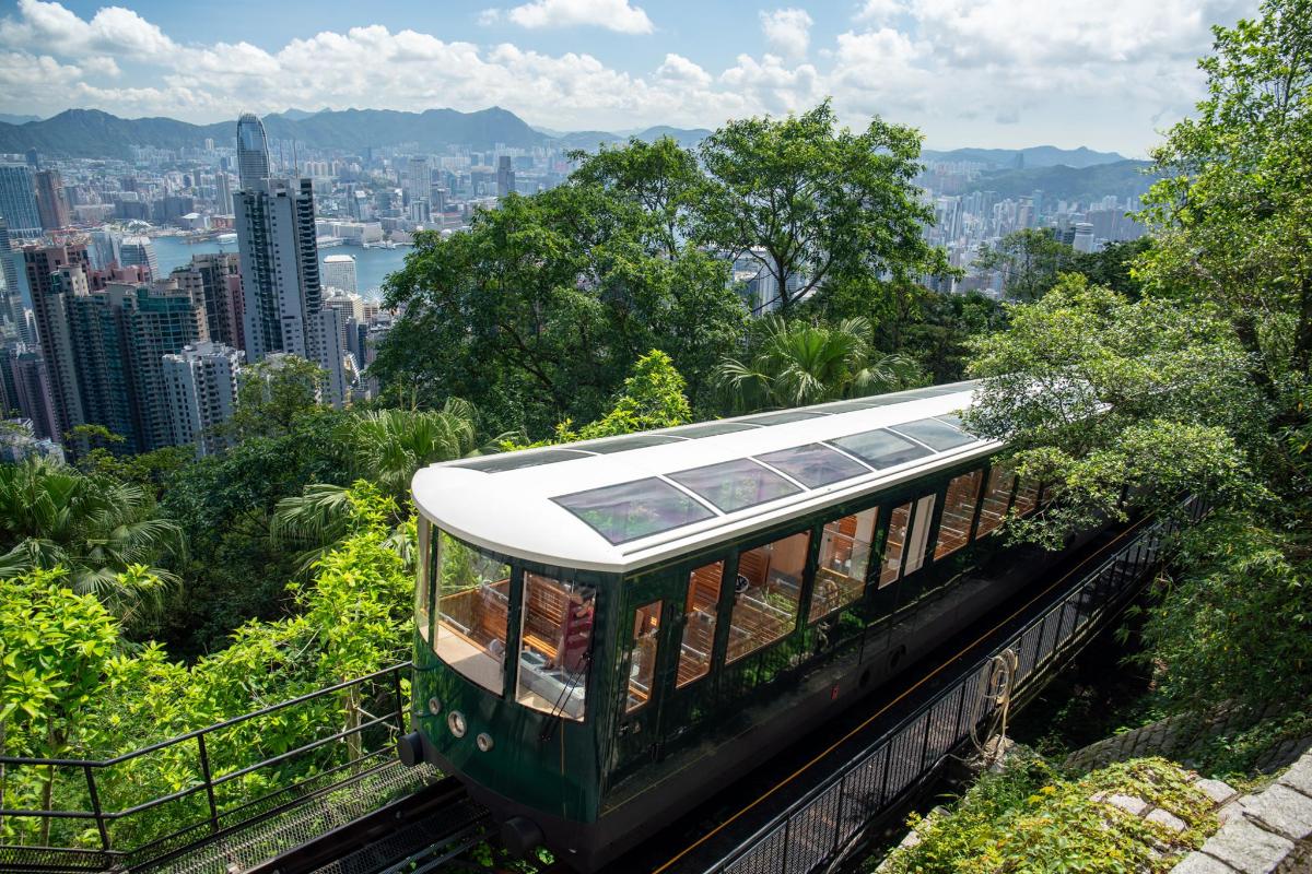 a trolley car on the top of a mountain