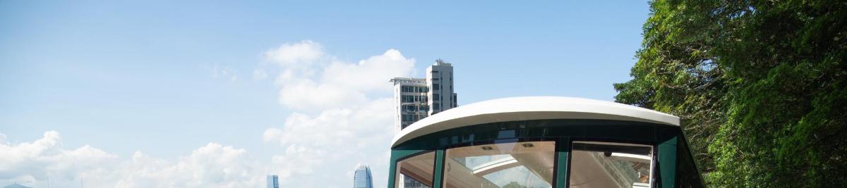a building with a window in front of a city