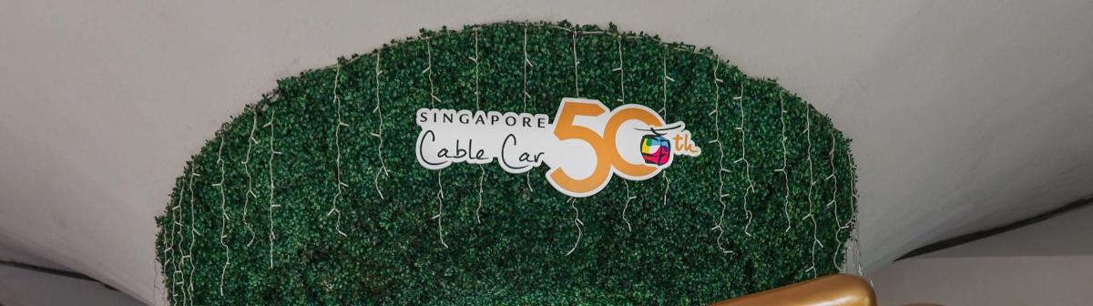 a green cake with writing on it with a green
